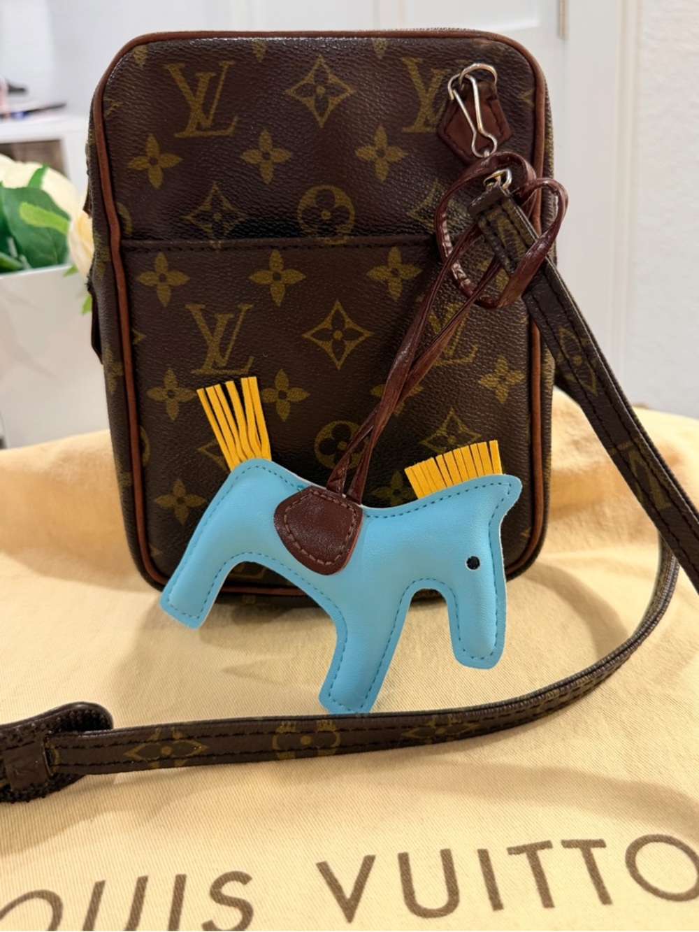 LV Danube leather crossbody bag & LV Dustie with horse charm & COA!